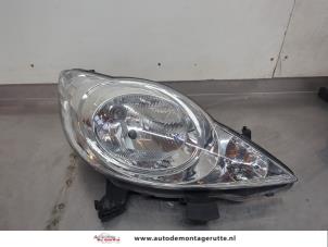 O195906 Gebruikte koplamp rechts Peugeot 107