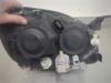 Gebruikte Koplamp links Nissan Almera Tino O196087