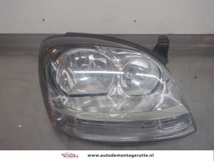 O196088 Gebruikte rechter koplamp Nissan Almera Tino