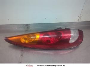 O196089 Gebruikte achterlicht links Nissan Almera Tino