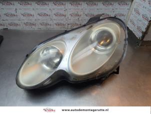 O196479 Gebruikte koplamp links Smart Forfour