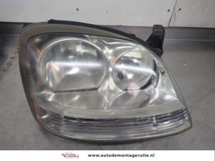 O196752 Gebruikte rechter koplamp Nissan Almera Tino