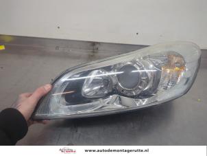 O197086 Gebruikte koplamp links Volvo C30