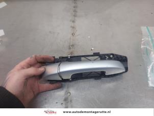 O197167 Gebruikte portiergreep 4deurs links-achter Volkswagen Golf