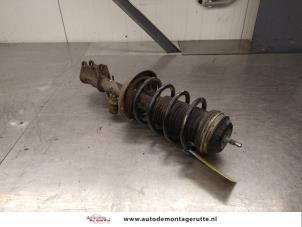 O197236 Gebruikte voorpoot links Opel Corsa