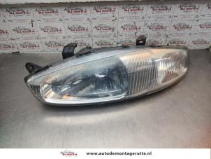 O197241 Gebruikte koplamp links Mitsubishi Colt