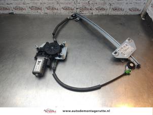 O197243 Gebruikte raammechaniek 2deurs links-voor Mitsubishi Colt