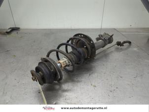 O197289 Gebruikte voorpoot links Ford KA
