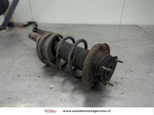 O197298 Gebruikte voorpoot rechts Ford Focus