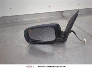 O197389 Gebruikte spiegel buiten links Daihatsu Sirion