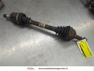 O197450 Gebruikte aandrijfas links-voor Renault Grand Scenic