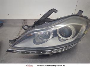 O197459 Gebruikte linker koplamp Lancia Delta