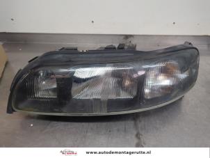 O197590 Gebruikte koplamp links Volvo S60
