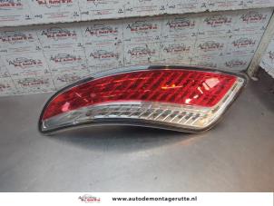 O197618 Gebruikte achterlicht links Lancia Delta