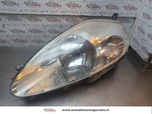 O197638 Gebruikte koplamp links Fiat Punto Grande