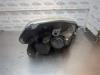 Gebruikte Koplamp links Fiat Punto Grande O197638