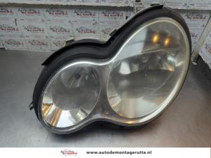 O198007 Gebruikte koplamp links Mercedes C-Klasse