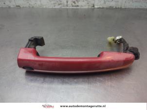 O198057 Gebruikte portiergreep 4deurs links-voor Suzuki Swift