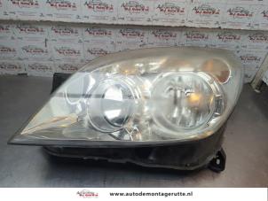 O198068 Gebruikte koplamp links Opel Astra