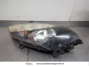 O198108 Gebruikte koplamp rechts Renault Scenic