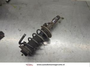 O198138 Gebruikte schokdemperpoot links-voor Volkswagen Polo
