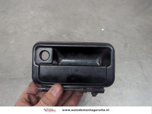 O198197 Gebruikte deurgreep 2deurs links Suzuki Swift