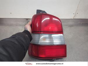 O198325 Gebruikte achterlicht links Mazda Demio