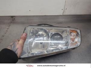 O198332 Gebruikte linker koplamp Skoda Fabia