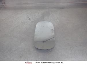 O198453 Gebruikte spiegelglas links Fiat Doblo