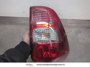 O198601 Gebruikte achterlicht links Daihatsu Terios