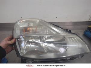 O198638 Gebruikte rechter koplamp Renault Modus