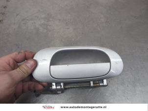 O198656 Gebruikte portiergreep 4deurs links-achter Mitsubishi Space Star