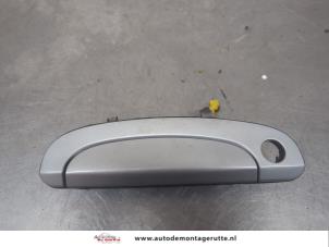 O198665 Gebruikte portiergreep 4deurs links-voor Hyundai Getz