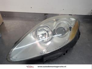 O198669 Gebruikte koplamp links Fiat Bravo