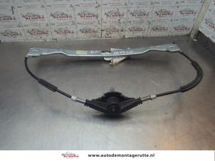 O198826 Gebruikte raammechaniek 4deurs rechts-achter Mitsubishi Colt