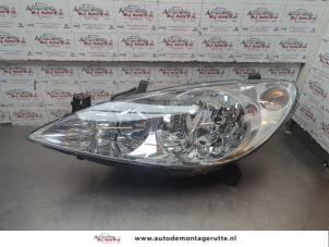 O198834 Gebruikte afdekkap koplamp links Peugeot 307