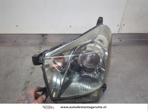 O198871 Gebruikte linker koplamp Toyota IQ