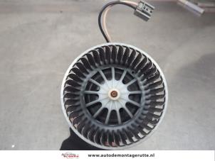 O198910 Gebruikte kachel ventilatiemotor Opel Astra