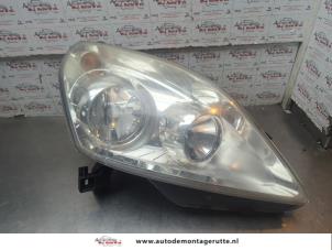 O199114 Gebruikte rechter koplamp Opel Zafira