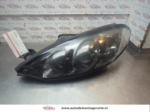 O199125 Gebruikte linker koplamp Ford Cougar