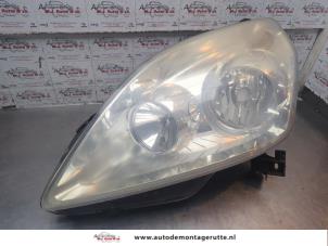 O199126 Gebruikte linker koplamp Opel Zafira