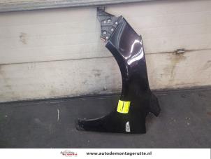 O199135 Gebruikte voorscherm links Opel Astra