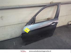 O199172 Gebruikte portier 4deurs links-voor BMW 1-Serie