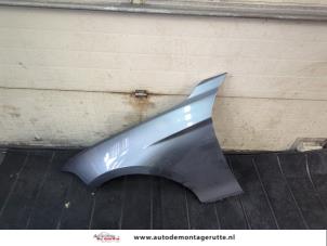 O199209 Gebruikte spatbord links-voor BMW 1-Serie