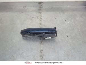 O199347 Gebruikte portiergreep 4deurs rechts-achter Nissan Note