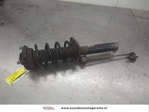 O199452 Gebruikte schokdemperpoot rechts-voor Volkswagen Passat