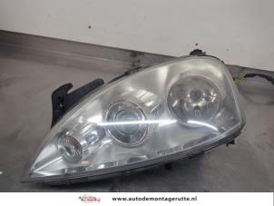 O199496 Gebruikte linker koplamp Opel Corsa