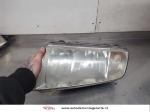O199504 Gebruikte koplamp links Skoda Fabia