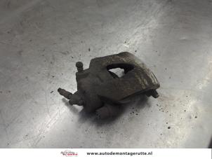 O199641 Gebruikte remklauw (tang) links-voor Seat Ibiza