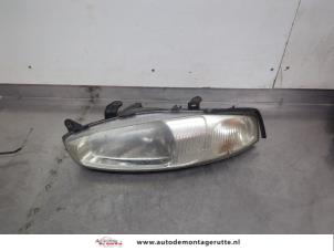 O199848 Gebruikte koplamp links Mitsubishi Colt